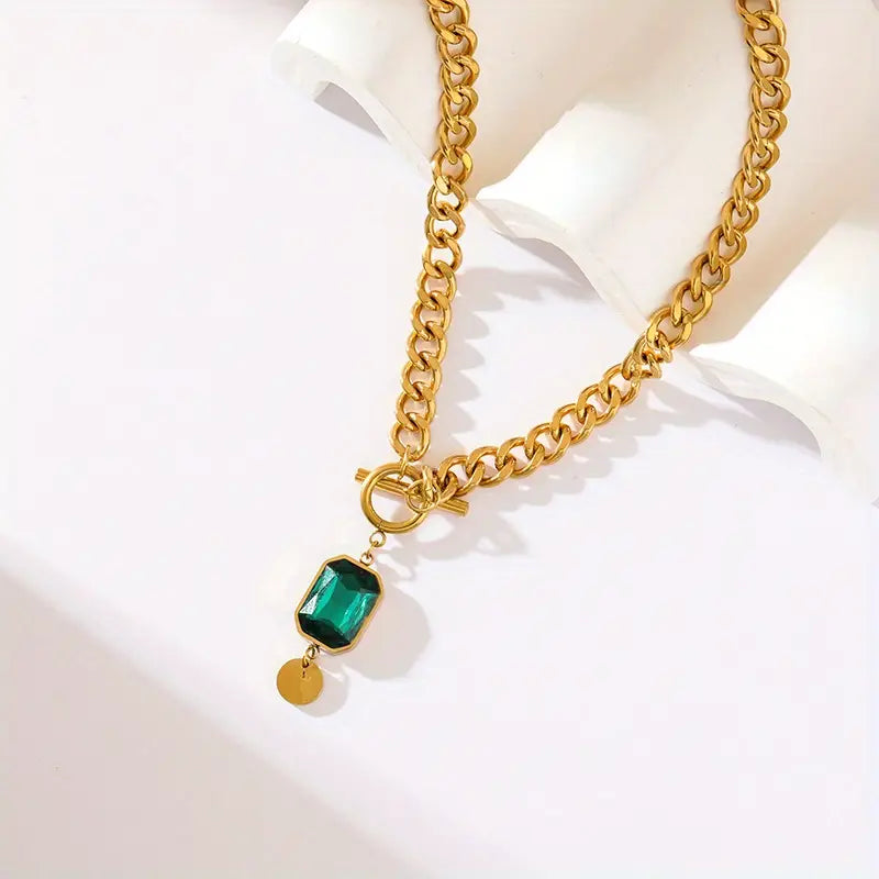Dikke ketting met smaragdgouden hanger