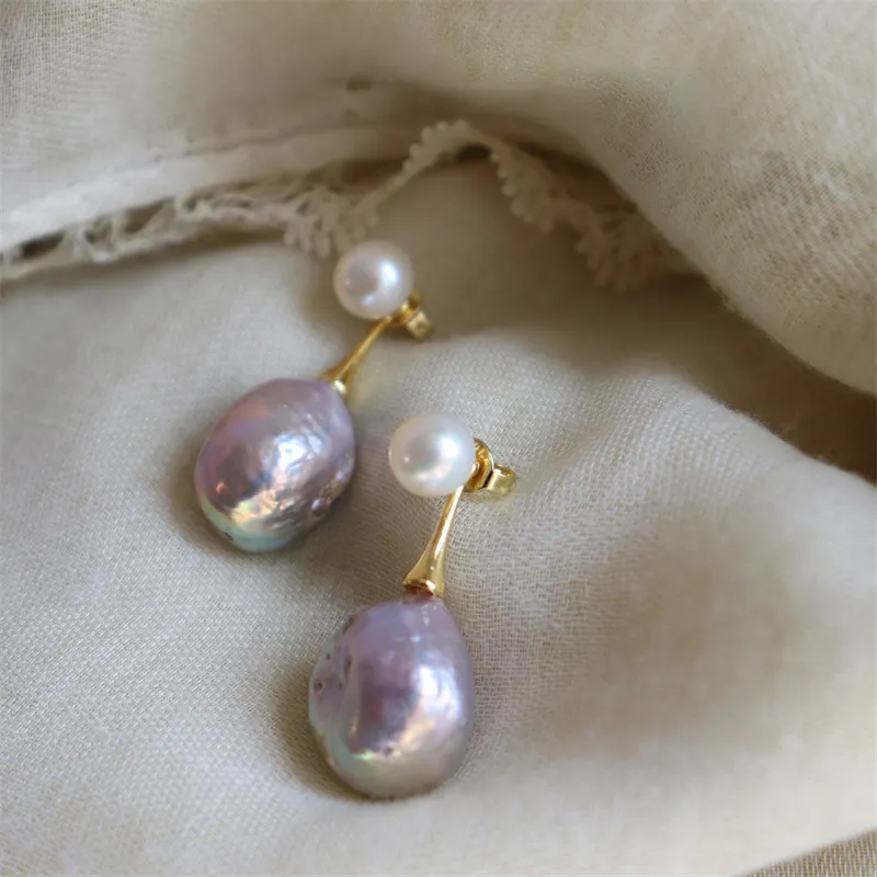Elegante lila parel oorbellen