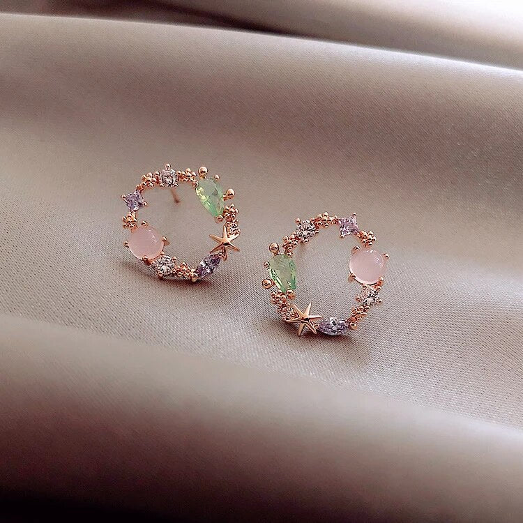 Kristallen bloemoorbellen in roségoud