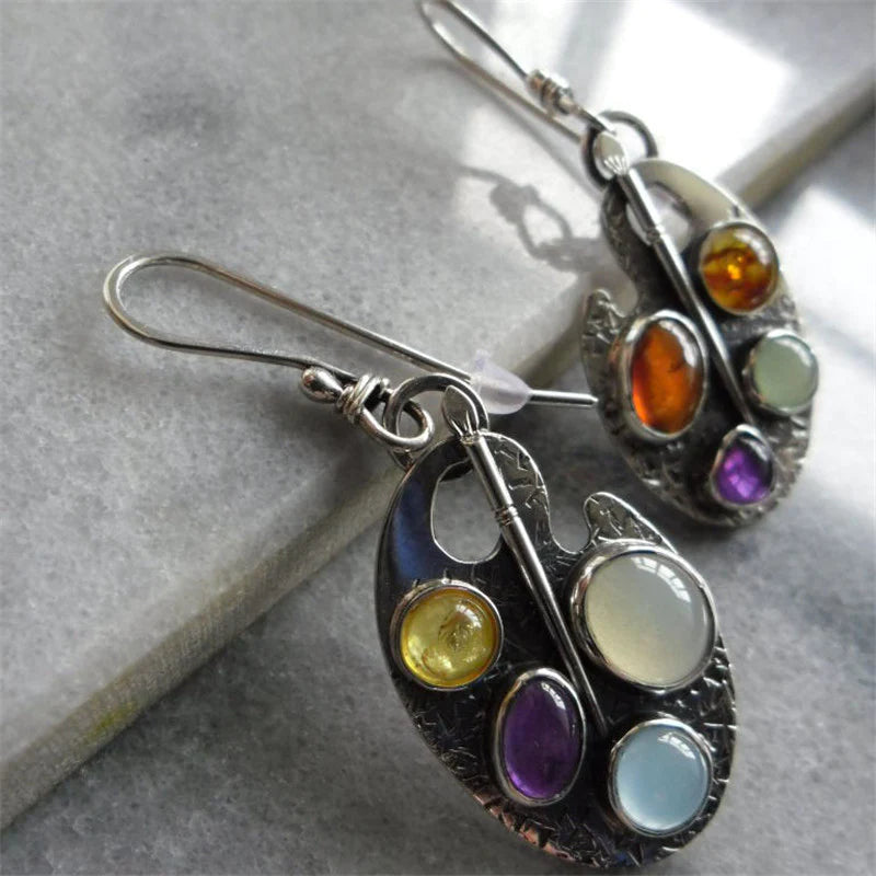 Oorbellen met hanger van veelkleurige stenen