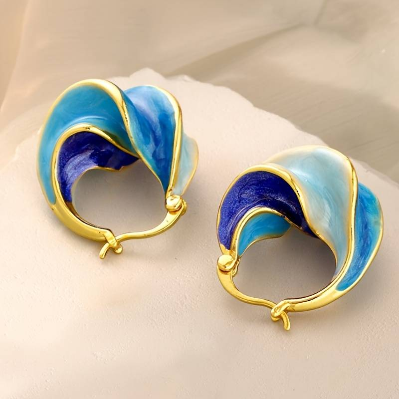 Oorbellen van blauw emaille in vintage goud