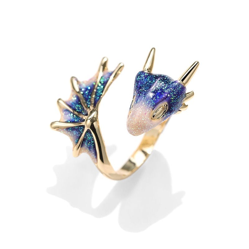 Verstelbare drakenring van zilver met handgeschilderd emaille.
