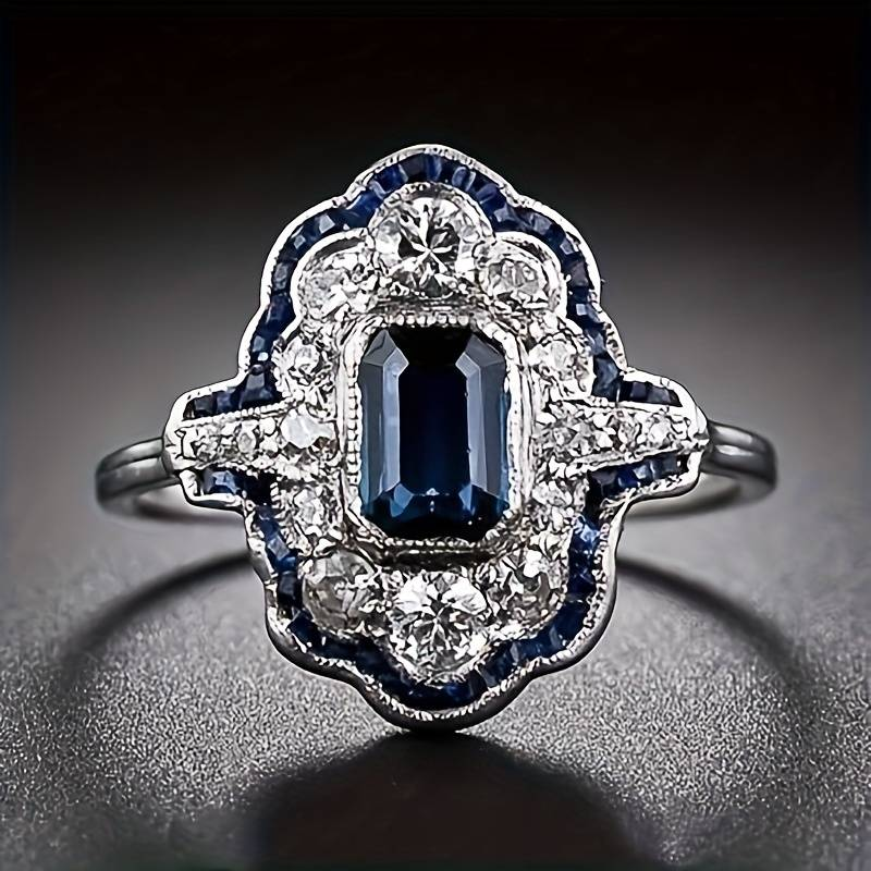 Vintage zilveren ring met blauwe kristallen