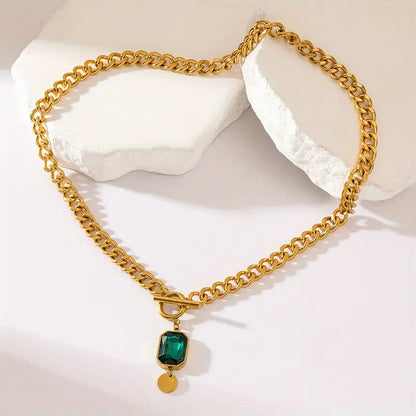 Dikke ketting met smaragdgouden hanger