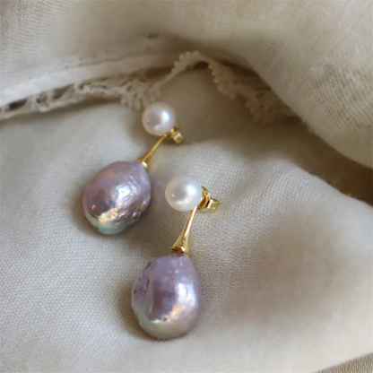 Elegante lila parel oorbellen