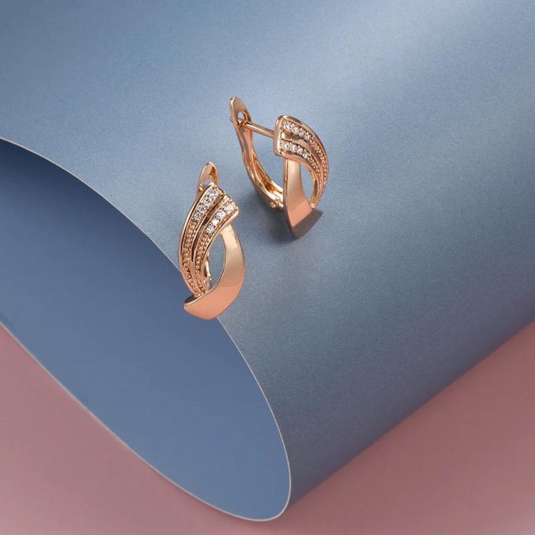 Elegante oorbellen met zirkonia in roségoud.
