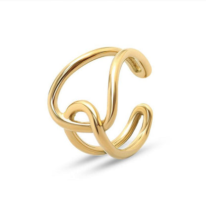 Gouden moderne ring met onregelmatige cirkels