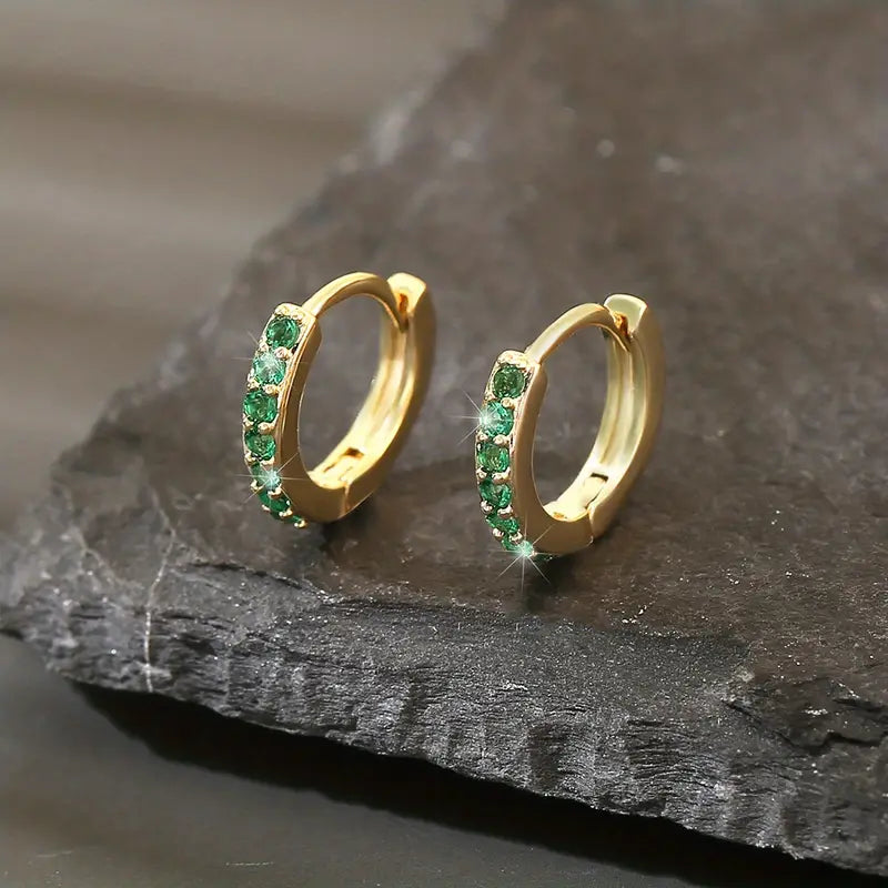 Gouden oorbellen met hangertjes in kuststijl