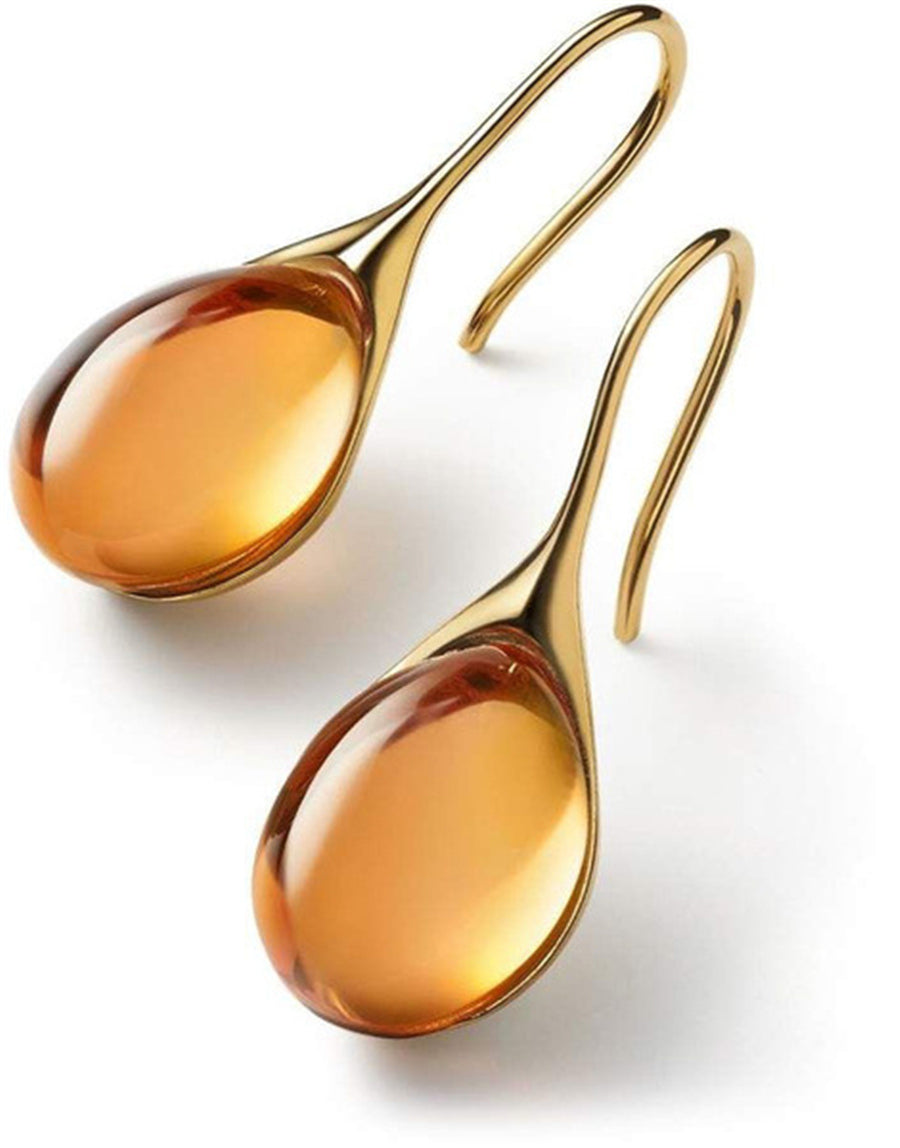 Kristallen oorbellen in goud en zilver.
