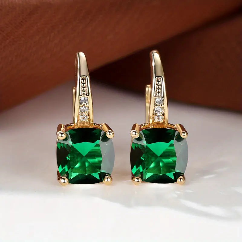 Mystieke saffierstenen oorringen van goud