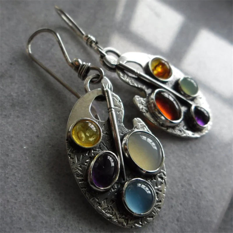 Oorbellen met hanger van veelkleurige stenen