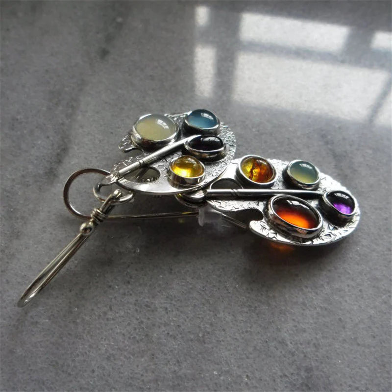 Oorbellen met hanger van veelkleurige stenen