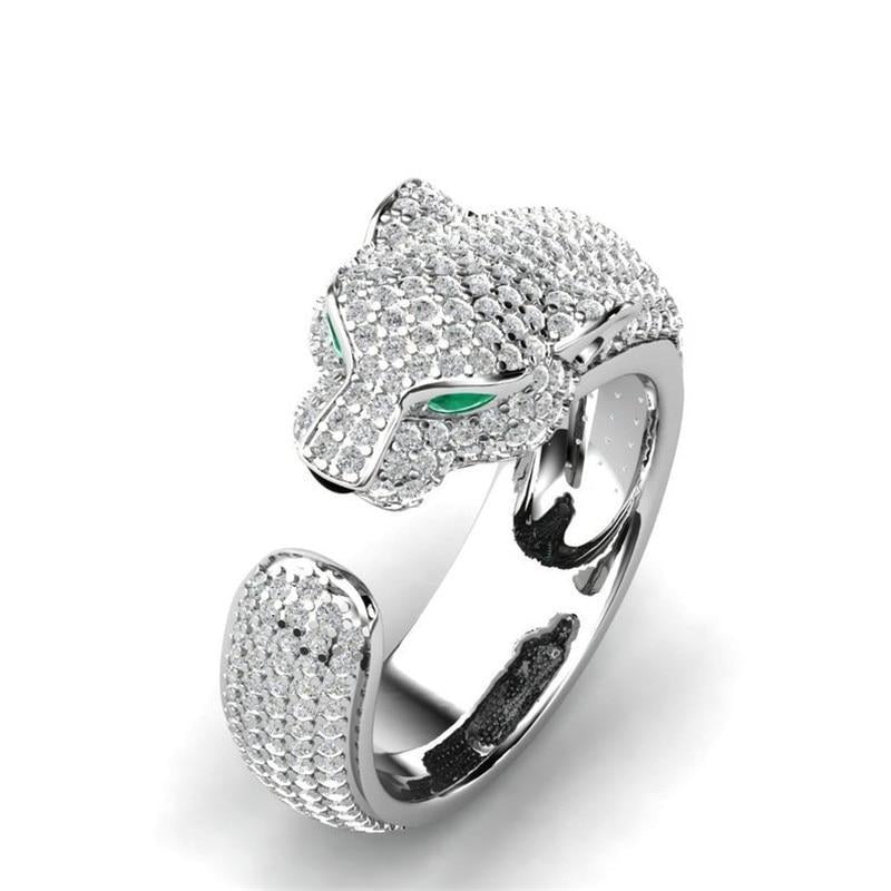 Verstelbare jaguarring van 18-karaats zilver en roségoud met groene zirkonia-ogen.