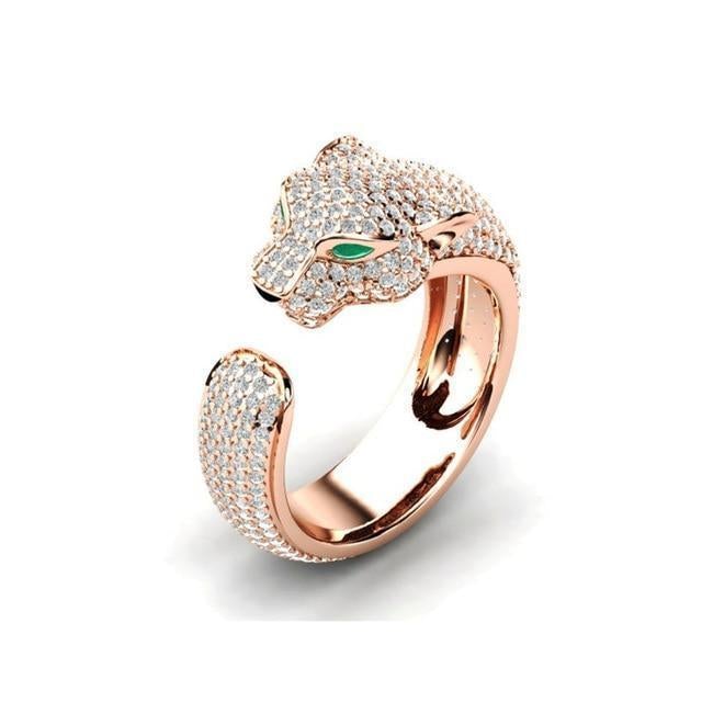 Verstelbare jaguarring van 18-karaats zilver en roségoud met groene zirkonia-ogen.