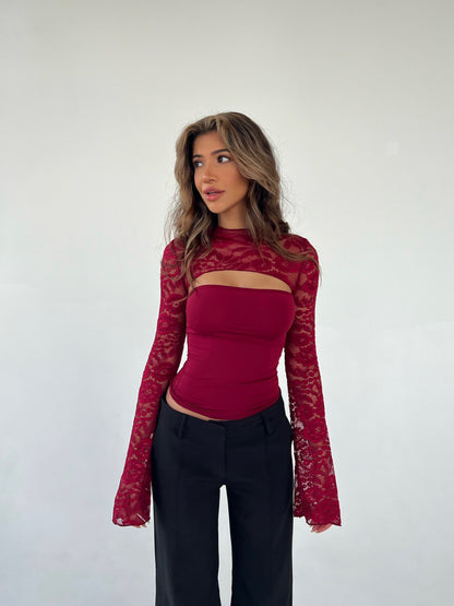 Top met Sierlijke Detailafwerking en Lange Mouwen