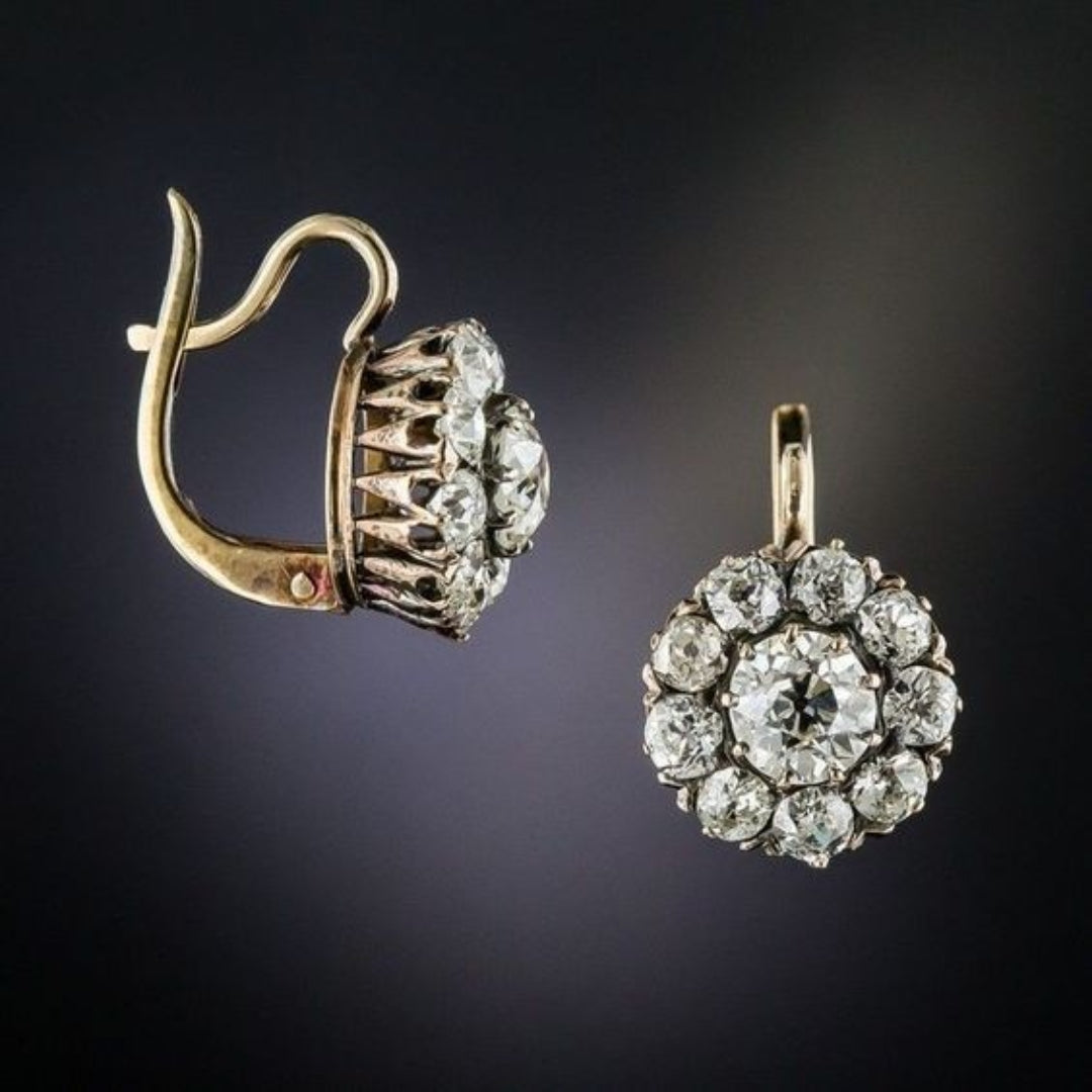 Vintage oorbellen van goud met ingelegde edelstenen