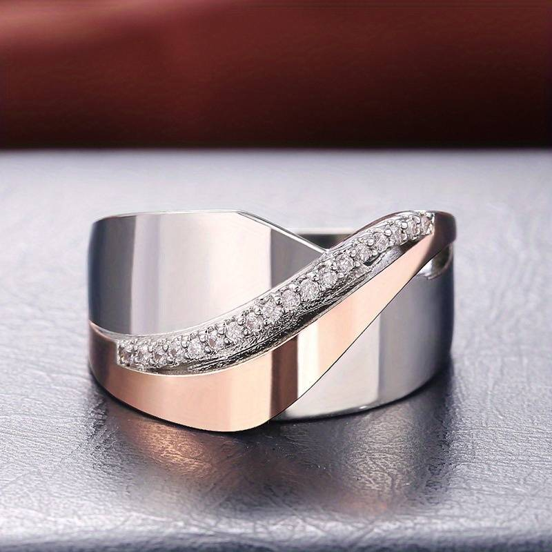 Vintage ring van roségoud en zilver met zirkonia.